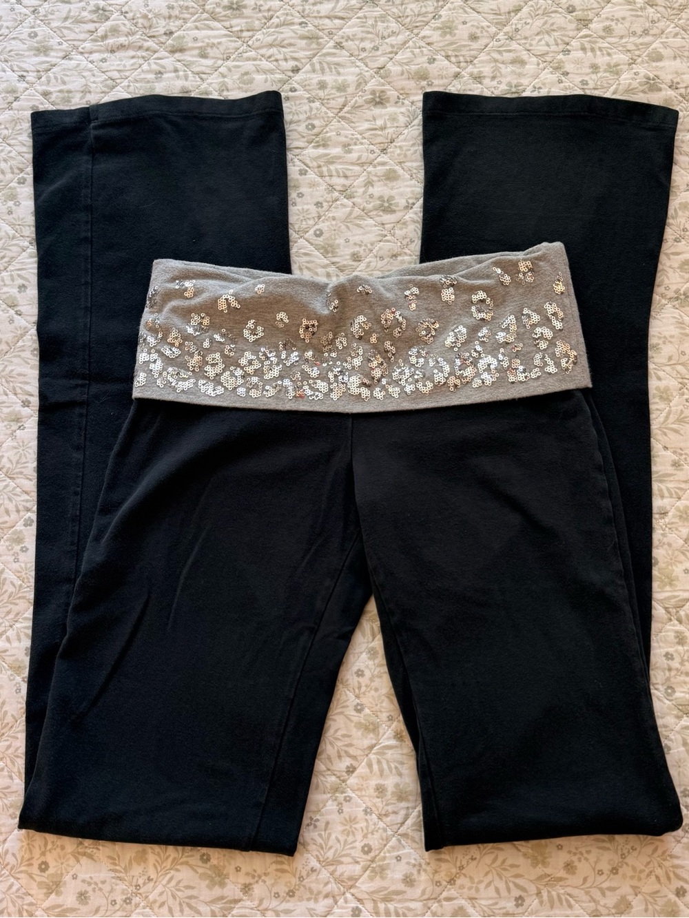 Victoria's Secret PINK black flare fold overs with cheetah silver sequins
